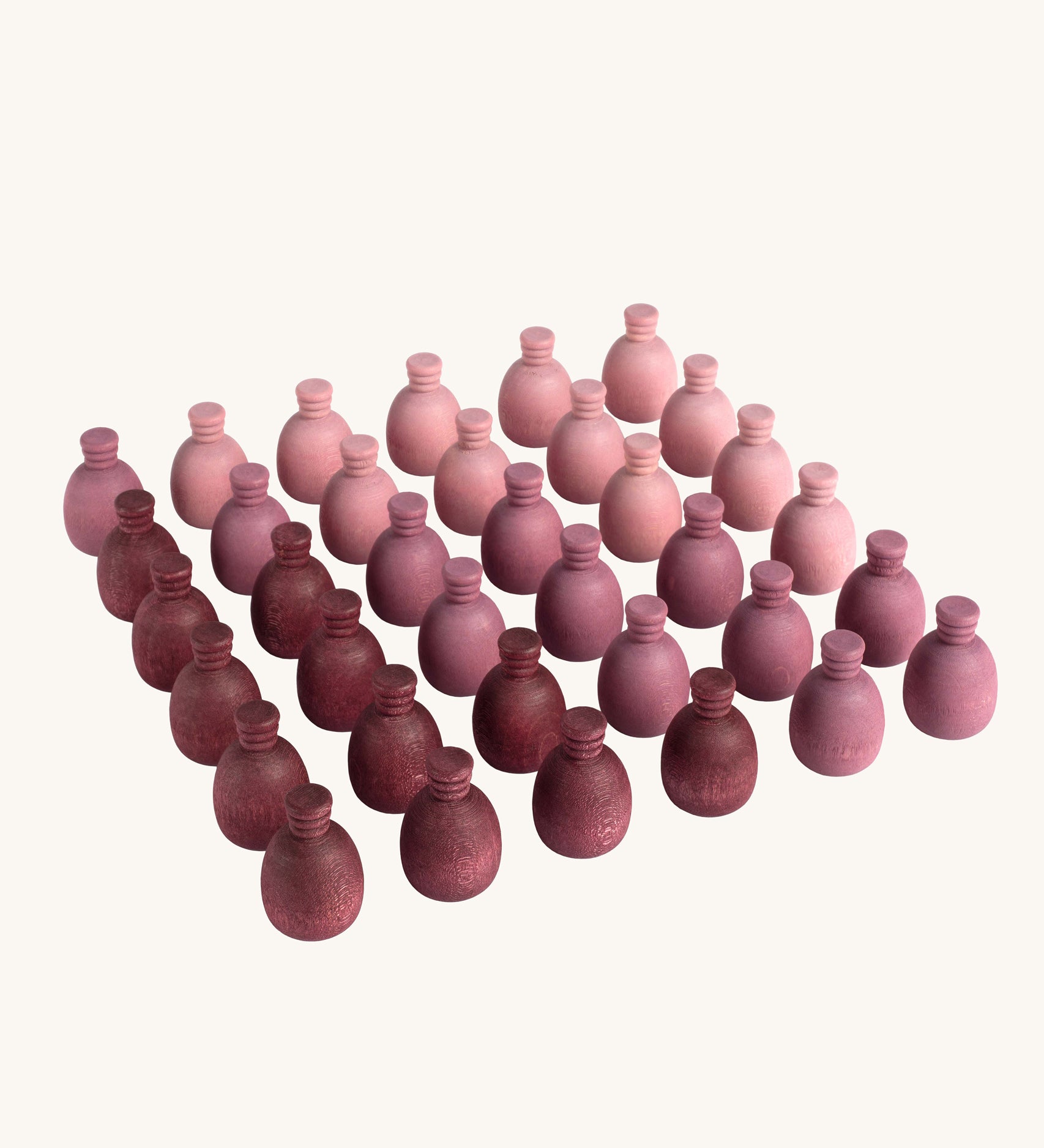 Grapat 36x Mandala Pineapples. 36 pineapple shaped mandala pieces in three shades of purple, 12 in each colour. Grapat have a wide range of wooden toys and loose parts available at Babipur. 