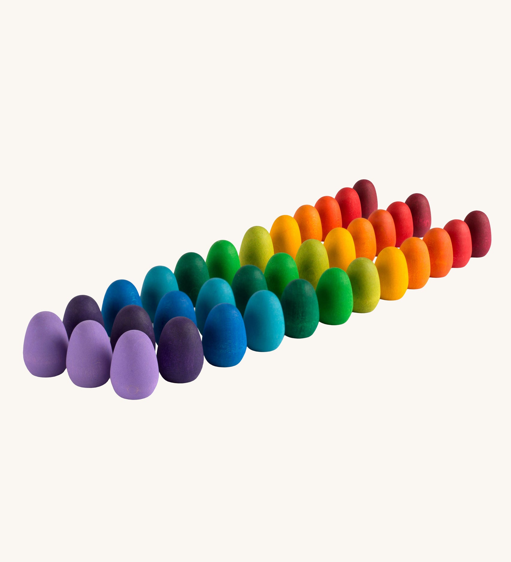 Grapat 36x Mandala Rainbow Eggs. A set of 36 wooden egg shaped pieces in a range of 12 colours. Grapat have a wide range of wooden toys and loose parts available at Babipur. 