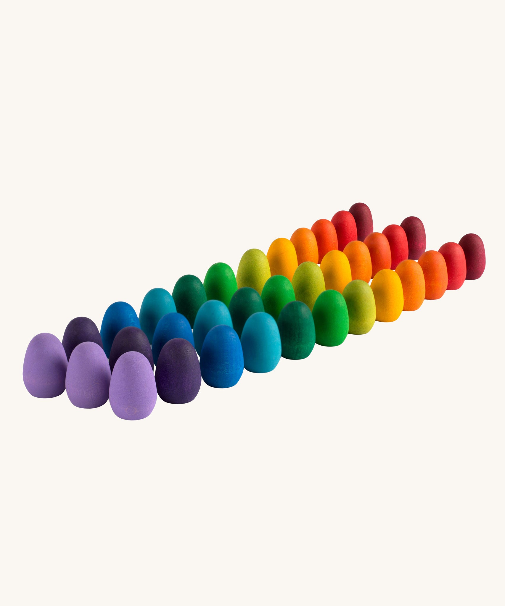 Grapat 36x Mandala Rainbow Eggs. A set of 36 wooden egg shaped pieces in a range of 12 colours. Grapat have a wide range of wooden toys and loose parts available at Babipur. 