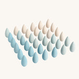 Grapat 36x Mandala Snowflakes. 36 snowflake shaped wooden loose parts in 2 shades of blue and white, 12 of each colour. Grapat have a wide range of wooden toys and loose parts available at Babipur. 