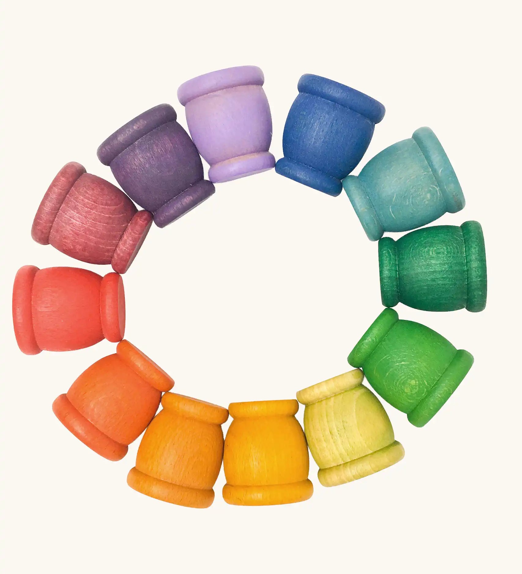 Grapat mates rainbow coloured wooden cup toys in 12 colours. 