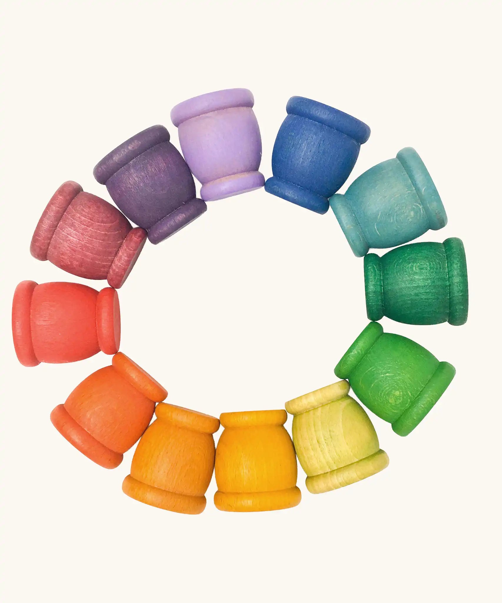Grapat mates rainbow coloured wooden cup toys in 12 colours. 