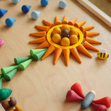 Flower flatlay made from Grapat handcrafted mini wooden honeycomb  and other loose pieces