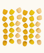 Grapat handcrafted mini wooden honeycomb mandala pieces. Set includes 36 loose pieces in shades of yellow