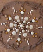 A mandala flatlay made from Grapat mini wooden mushroom pieces