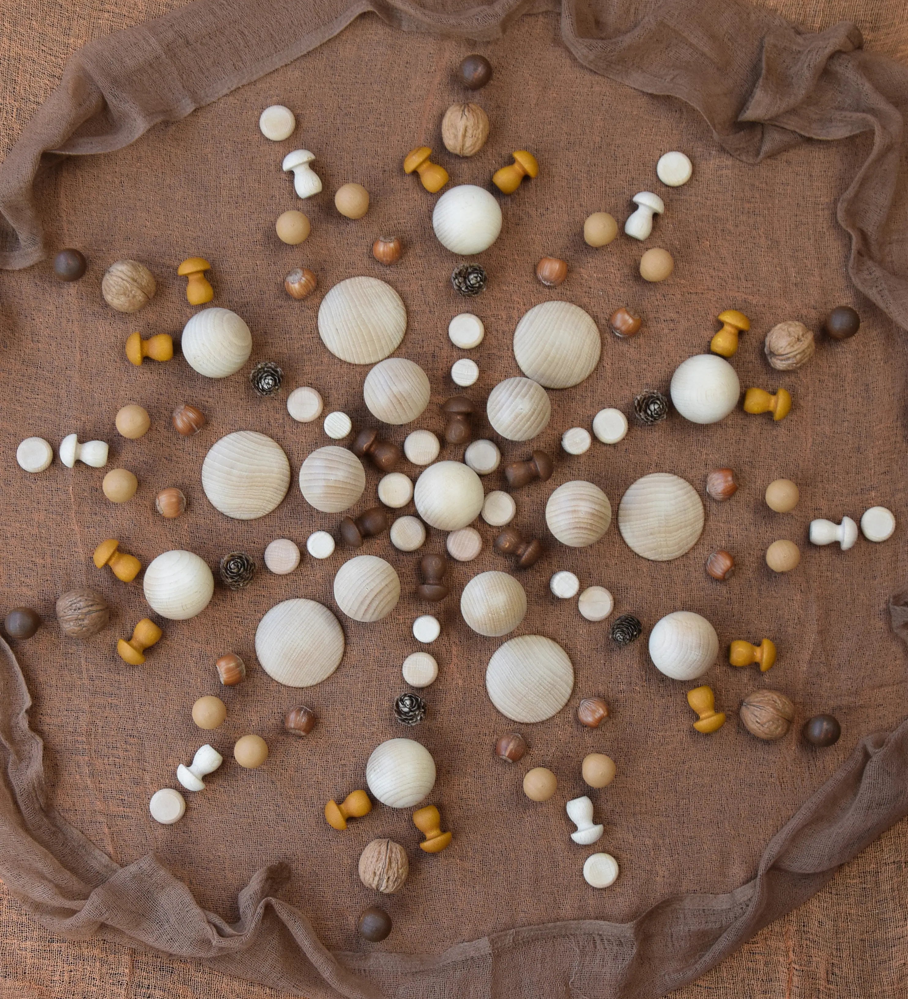 A mandala flatlay made from Grapat mini wooden mushroom pieces
