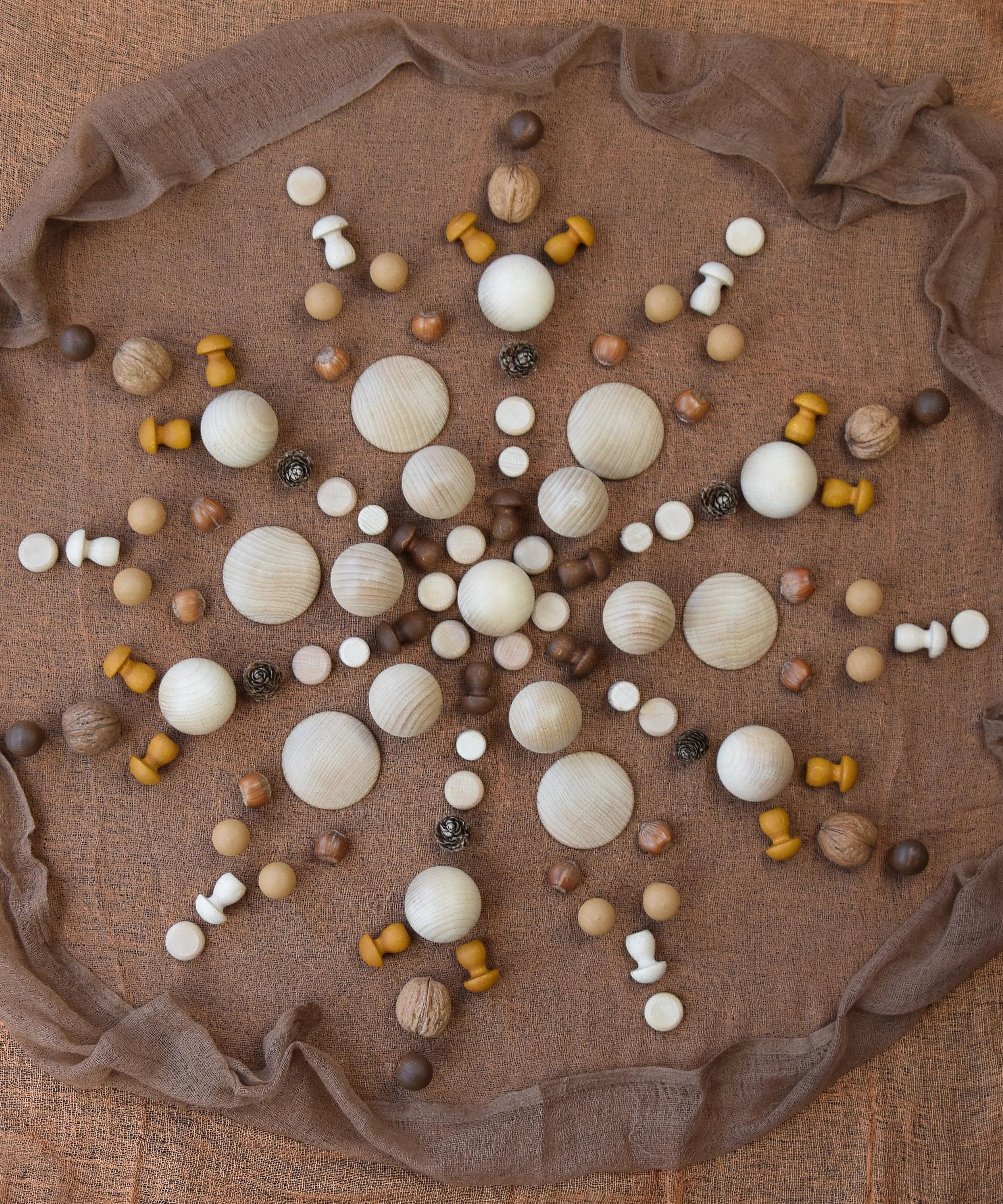 A mandala flatlay made from Grapat mini wooden mushroom pieces
