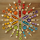 A mandala flatlay using a number of Grapat natural and coloured loose pieces