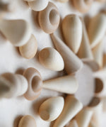 Close up of a mandala creating using the Grapat Natural Wood Mandala.