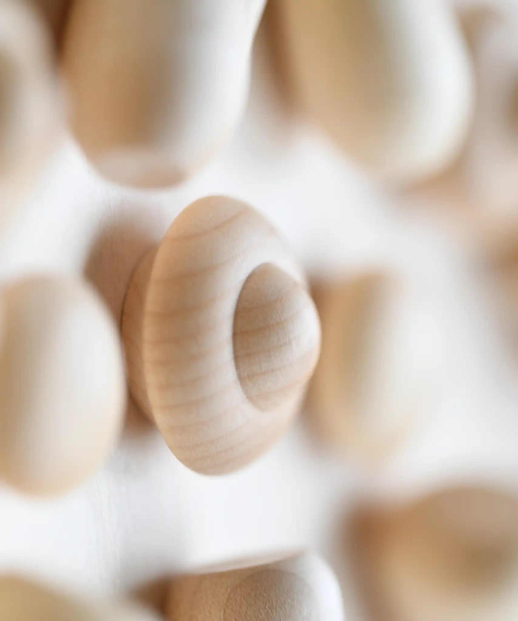 Close up of a mandala creating using the Grapat Natural Wood Mandala.