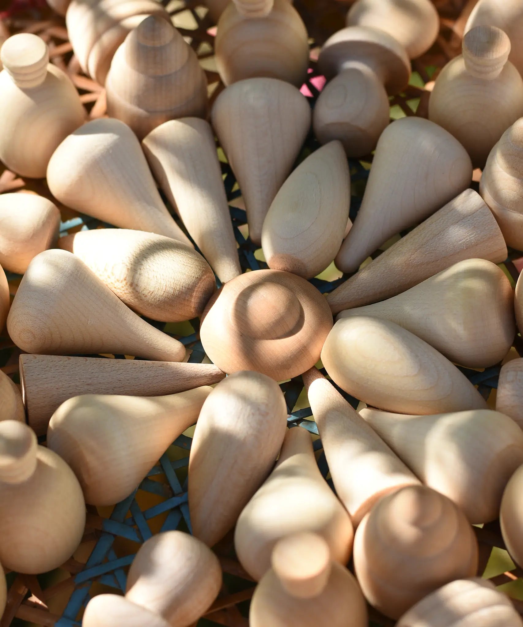 Close up of Grapat natural mandala pieces placed in a mandala. 