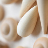 Close up of pieces in a mandala creating using the Grapat Natural Wood Mandala.