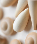 Close up of pieces in a mandala creating using the Grapat Natural Wood Mandala.