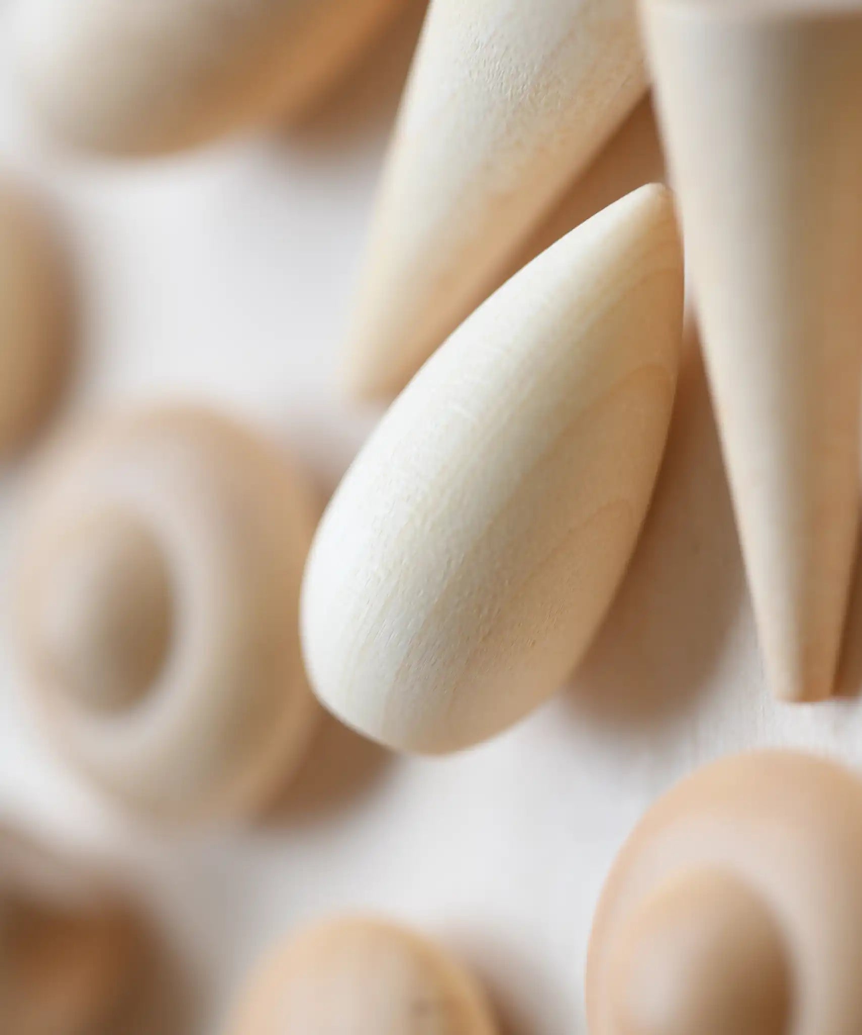 Close up of pieces in a mandala creating using the Grapat Natural Wood Mandala.