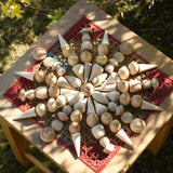 Mandala created using Grapat natural mandala pieceson a stoll outdoors.