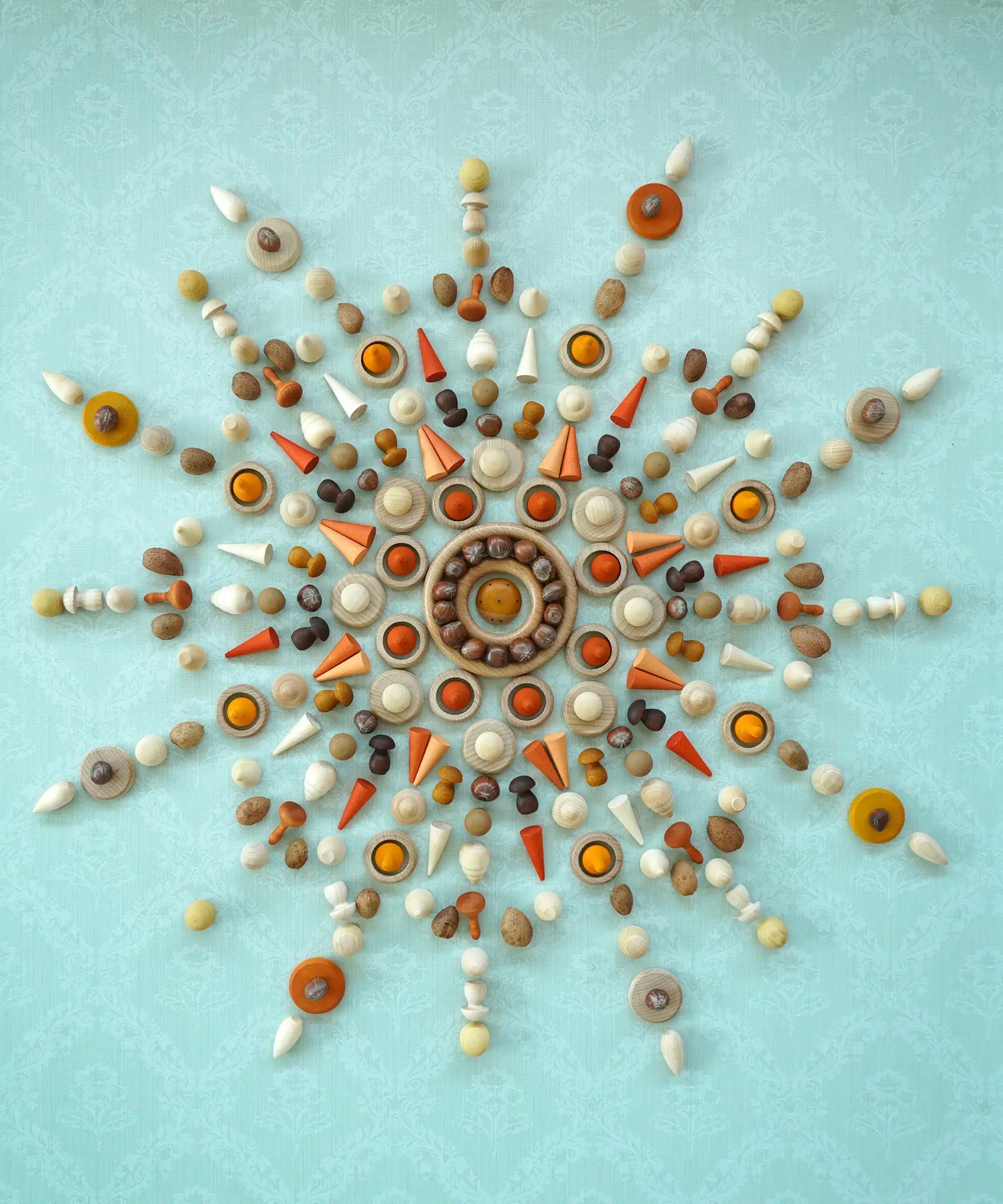 A decorative mandala flatlat using handcrafted wooden Grapat loose pieces