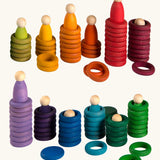 Grapat Nins Carla wooden toy set with peg dolls, rings and coins.