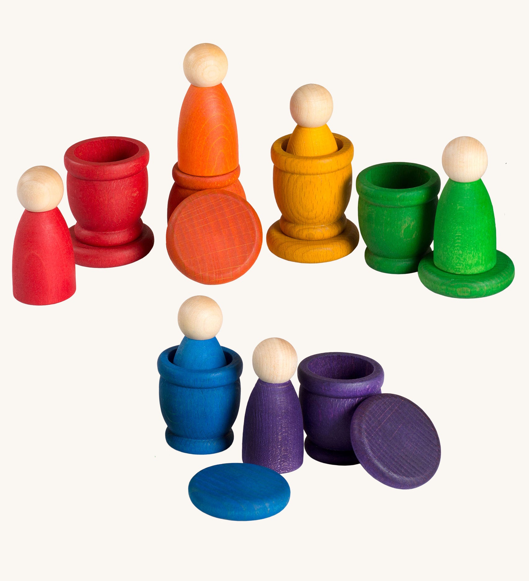 Grapat Wooden Peg Doll Nins®, Mates (Cups) and Coins in 6 rainbow colours. These wooden toys are part of a wide range of open ended toys available at Babipur.  