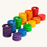 Grapat Wooden Peg Doll Nins®, Rings and Coins wooden toy play set. These wooden toys are part of a wide range of open ended toys available at Babipur.  