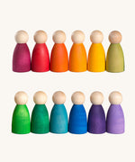 Grapat 12 Rainbow Nins wooden peg dolls. These wooden toys are part of a wide range of open ended toys available at Babipur.  