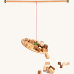 Grapat the pendlum set - handcrafted wooden pendulum. Features a wooden balancing board and wooden pole with different sized handcrafted wooden blocks balancing and falling off the pendulum. Ideal for balancing games.