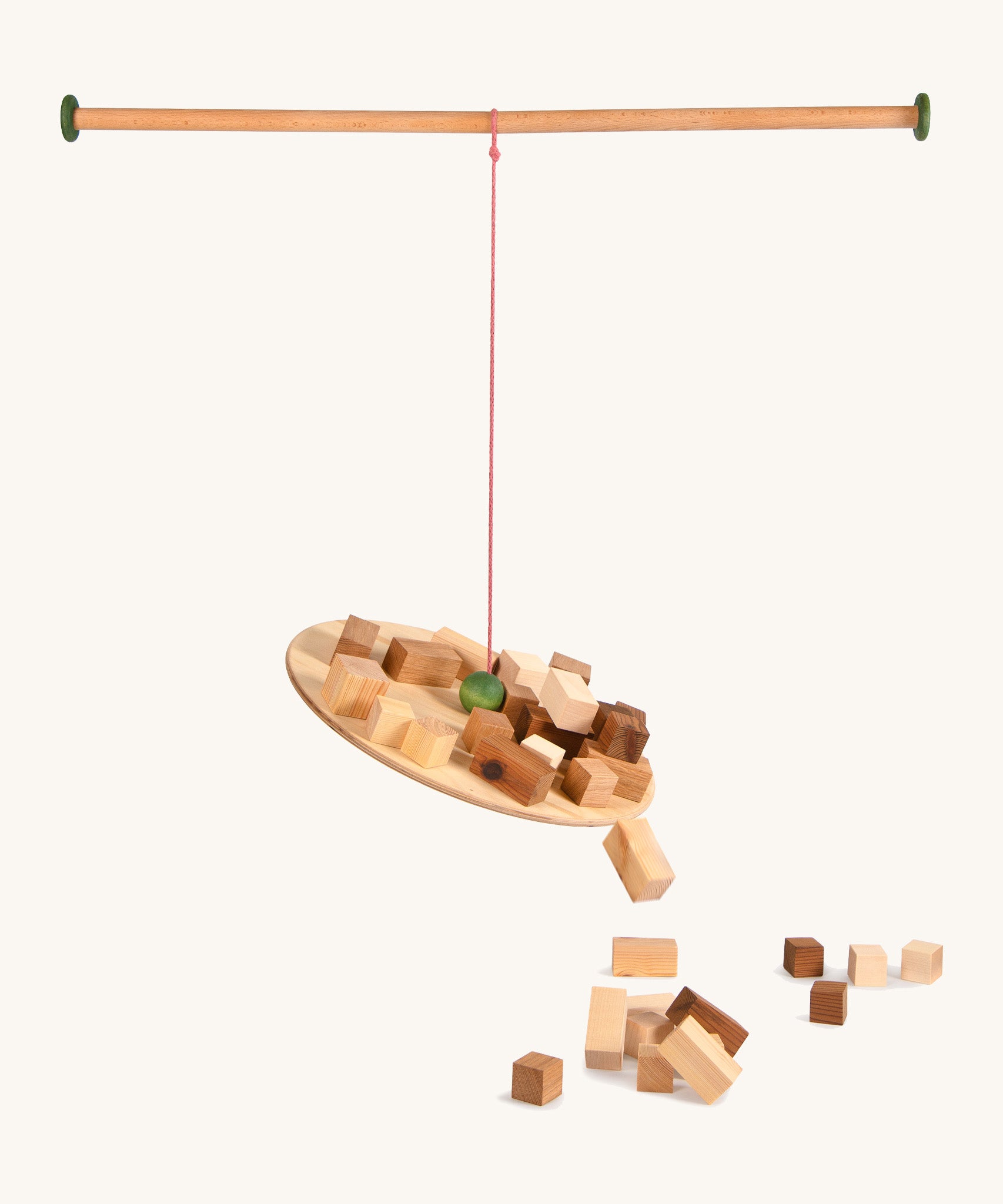 Grapat the pendlum set - handcrafted wooden pendulum. Features a wooden balancing board and wooden pole with different sized handcrafted wooden blocks balancing and falling off the pendulum. Ideal for balancing games.