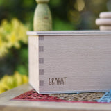 Close up of the logo engraved onto the Grapat permanance box.