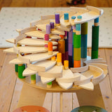 A ball run created using the Grapat petals wooden platforms with the Lola figures. The wooden petals come as a set of 24. These wooden petals are part of a huge range of open ended wooden toys from Grapat available here at Babipur.