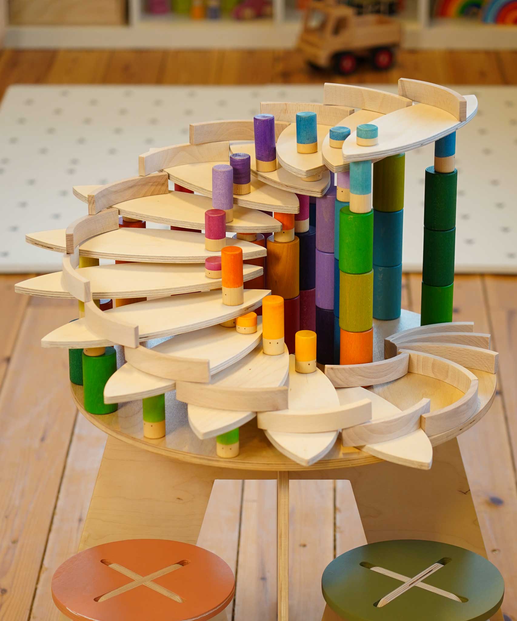 A ball run created using the Grapat petals wooden platforms with the Lola figures. The wooden petals come as a set of 24. These wooden petals are part of a huge range of open ended wooden toys from Grapat available here at Babipur.