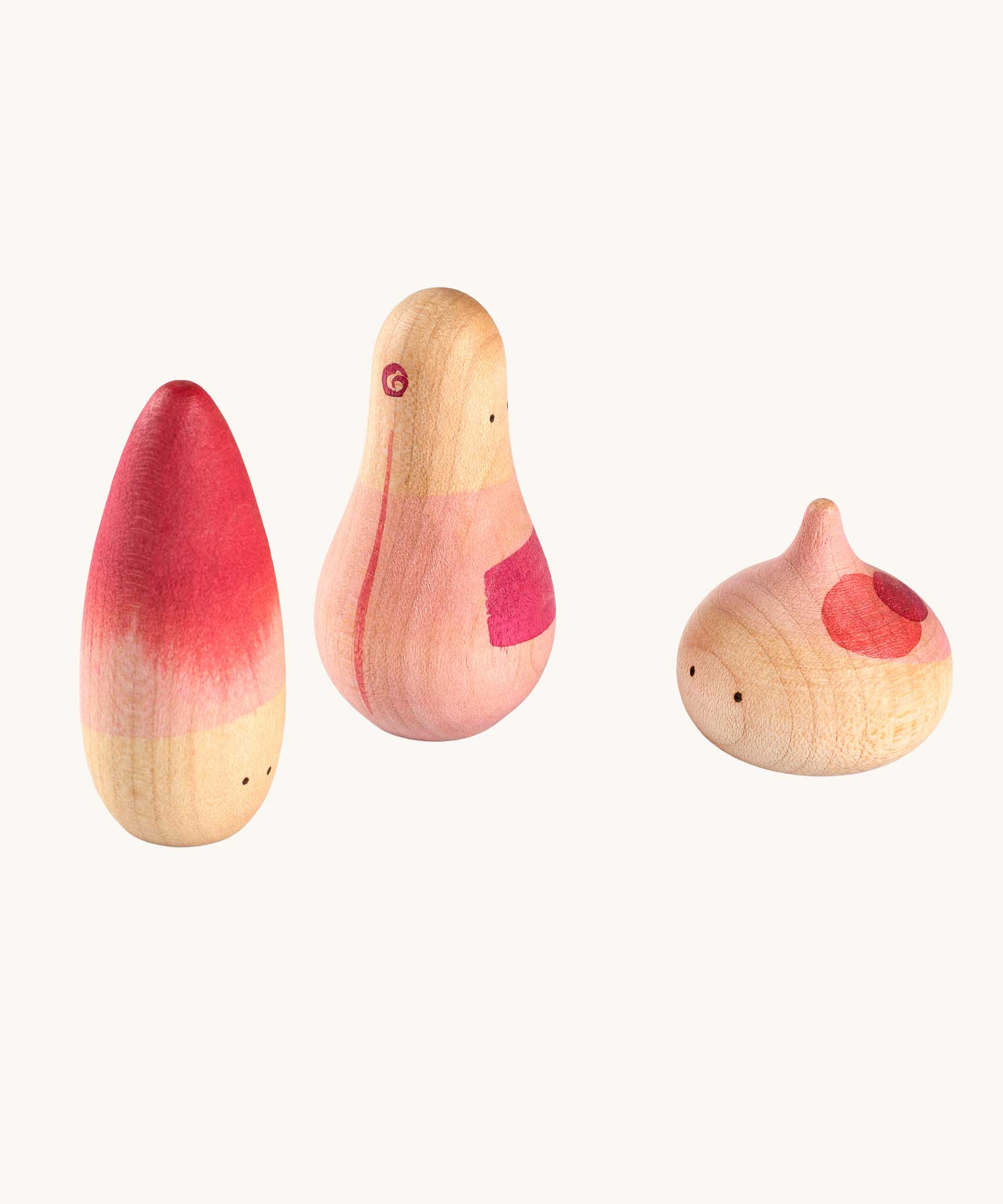 Grapat 3 Yay! Wooden Figures Play Set. This set of three figures are decorated with pink coloured details. These wooden loose part toys are part of a wide range of open ended toys available at Babipur. 