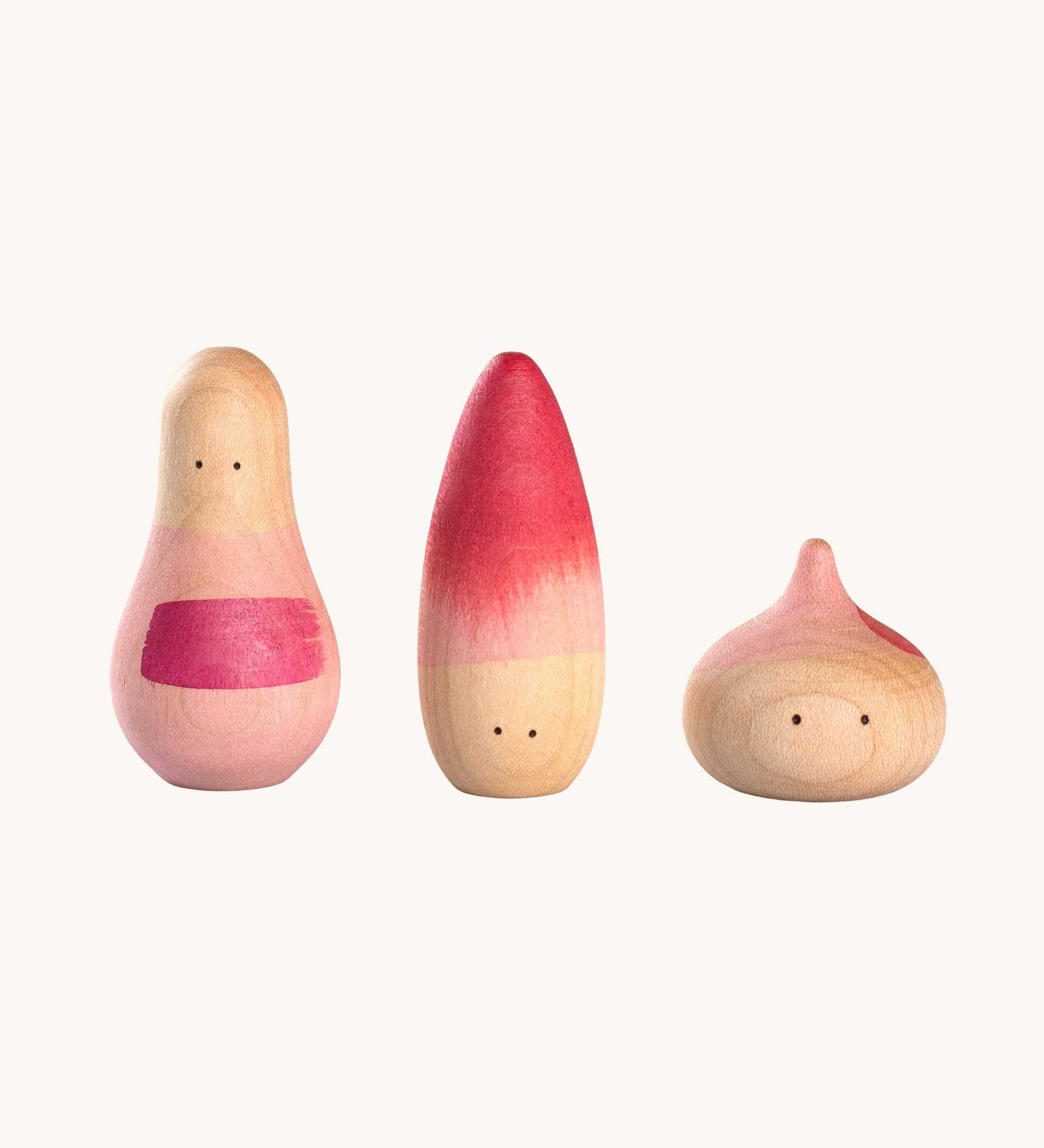 Grapat 3 Yay! Wooden Figures Play Set. This set of three figures are decorated with pink coloured details. These wooden loose part toys are part of a wide range of open ended toys available at Babipur. 