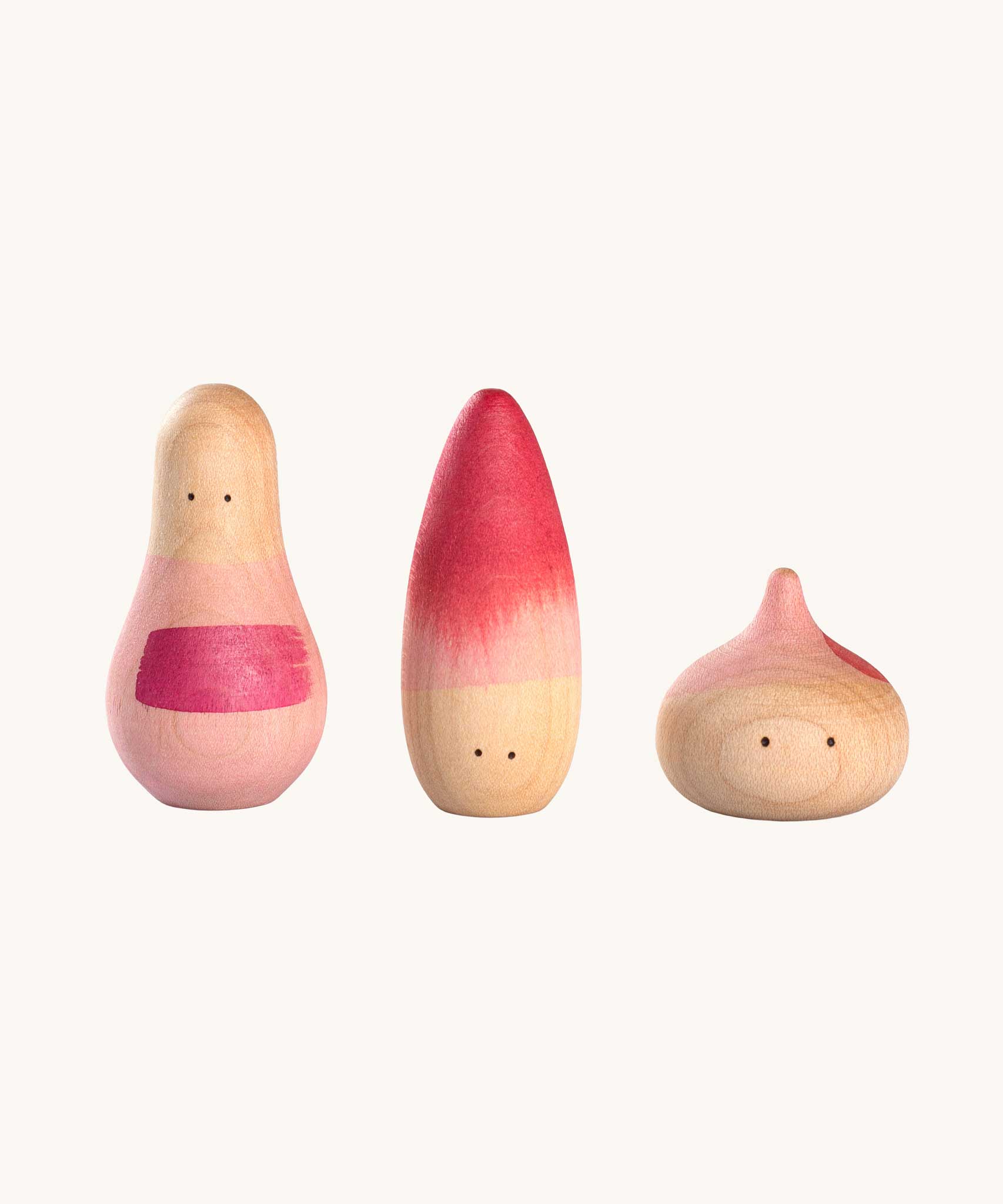 Grapat 3 Yay! Wooden Figures Play Set. This set of three figures are decorated with pink coloured details. These wooden loose part toys are part of a wide range of open ended toys available at Babipur. 