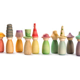 Grapat wooden Fancy Nins rainbow peg doll toys lined up on a white background