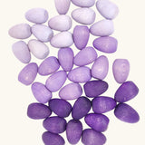 Grapat 36x Mandala Eggs.Wooden egg shaped mandala pieces in three different shades of purple. 