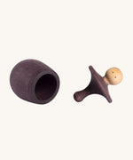 Grapat purple Little Things. A wooden top with eyes drawn on and a purple coloured pot to match. Grapat have a wide range of wooden toys and loose parts available at Babipur. 