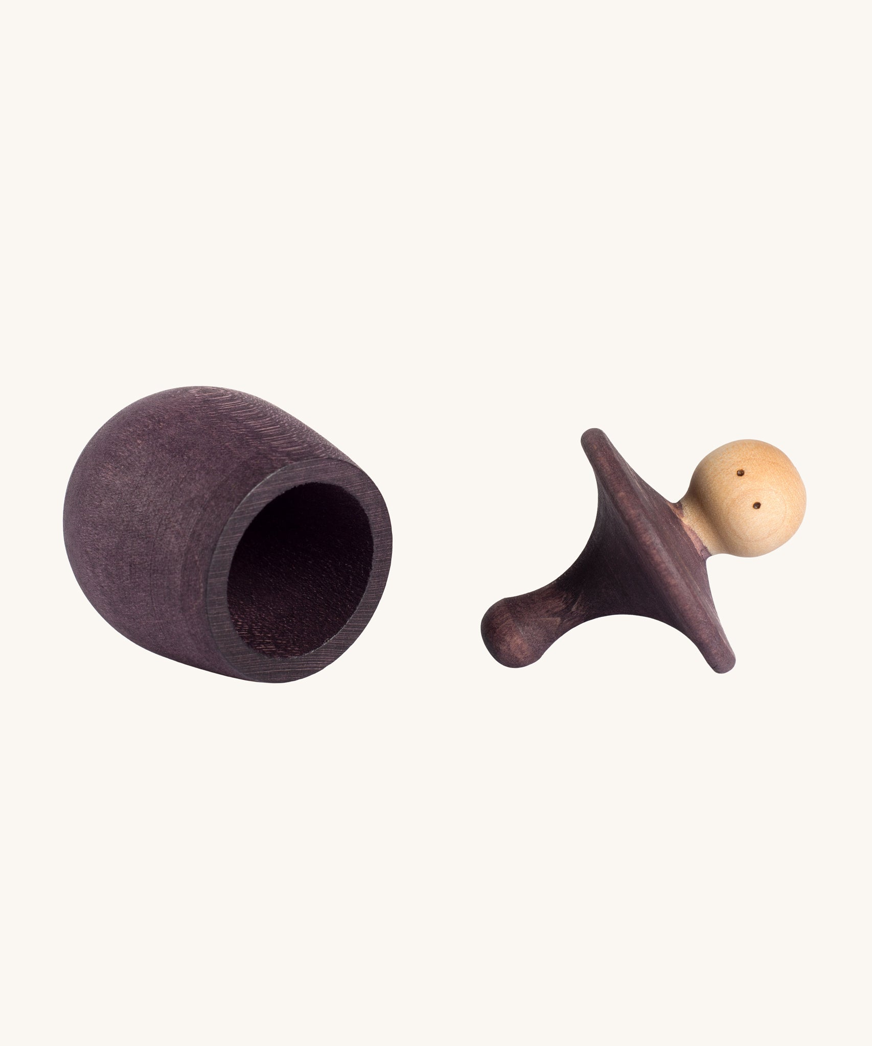 Grapat purple Little Things. A wooden top with eyes drawn on and a purple coloured pot to match. Grapat have a wide range of wooden toys and loose parts available at Babipur. 