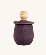 Grapat purple Little Things. A wooden top with eyes drawn on and a purple coloured pot to match. Grapat have a wide range of wooden toys and loose parts available at Babipur. 