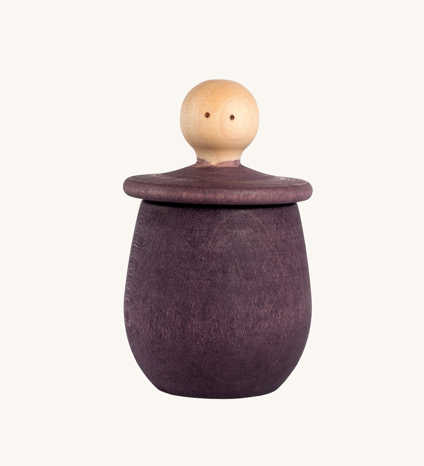 Grapat purple Little Things. A wooden top with eyes drawn on and a purple coloured pot to match. Grapat have a wide range of wooden toys and loose parts available at Babipur. 