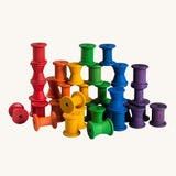 Grapat set of 36 wooden rainbow coloured spools. These wooden toys are part of a wide range of open ended toys available at Babipur.  