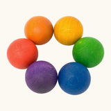 A set of 6 Grapat handcrafted wooden balls in rainbow inspired colours. Perfect for sorting games and creative play