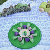 Mandala created with a green Grapat rainbow dish as a base.