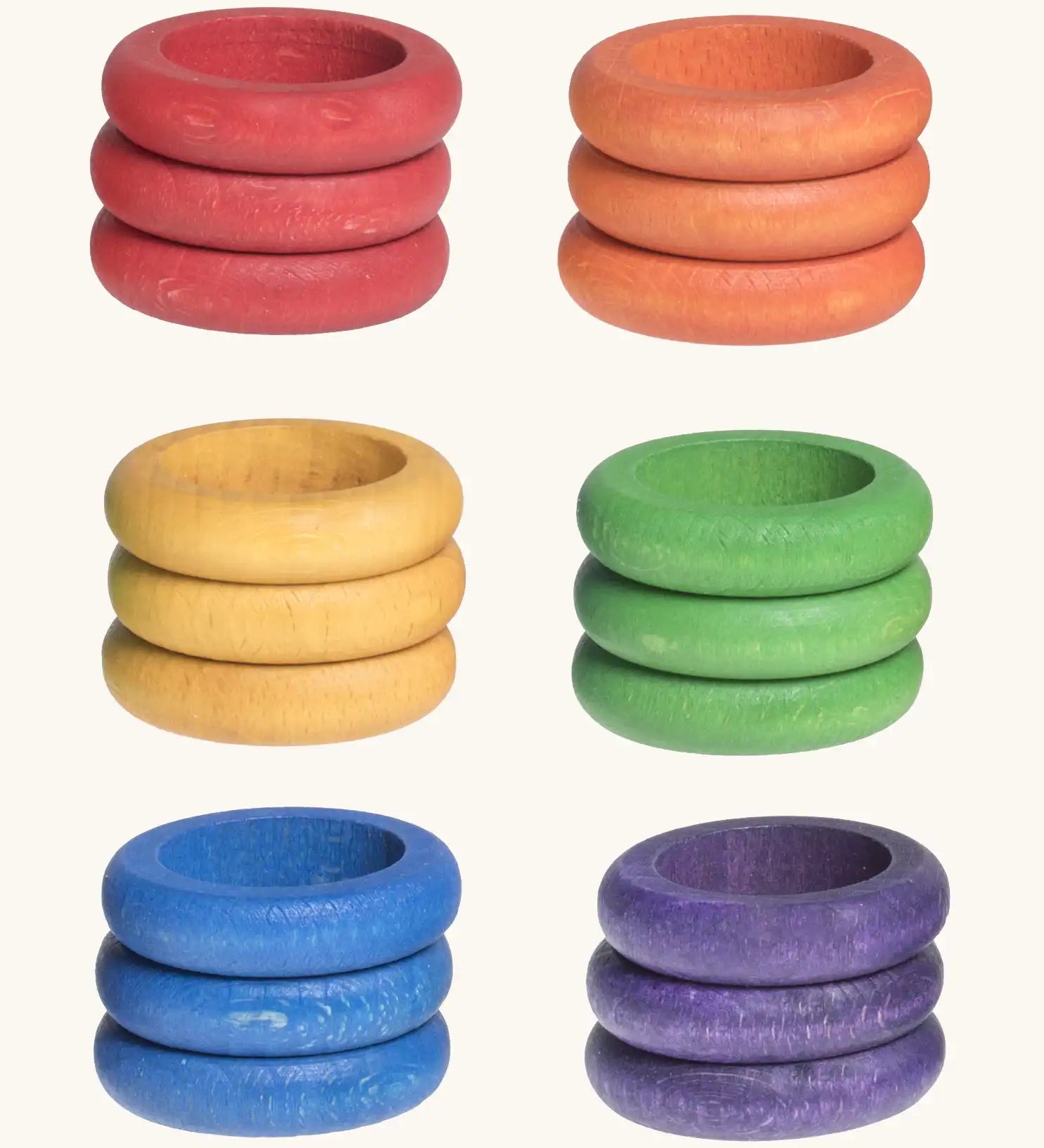 Grapat handcrafted wooden ring loose pieces in 6 rainbow colours, in a set of 18. Perfect for creative play and pattern making