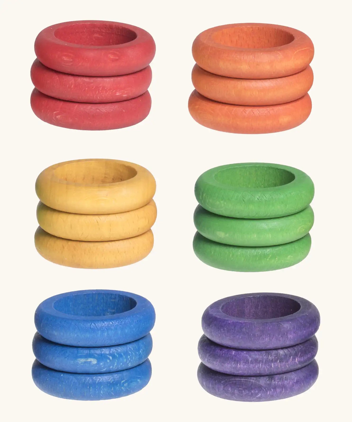 Grapat handcrafted wooden ring loose pieces in 6 rainbow colours, in a set of 18. Perfect for creative play and pattern making