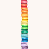 Grapat Loose Parts Rainbow Coins 12 Colours in a pack of 36 wooden coins with 3 of each of the 12 colours. Grapat have a wide range of wooden loose parts and toys available at Babipur. 