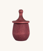 Grapat Red Little Things. A wooden top with eye drawn on and a red coloured pot to match. Grapat have a wide range of wooden toys and loose parts available at Babipur. 