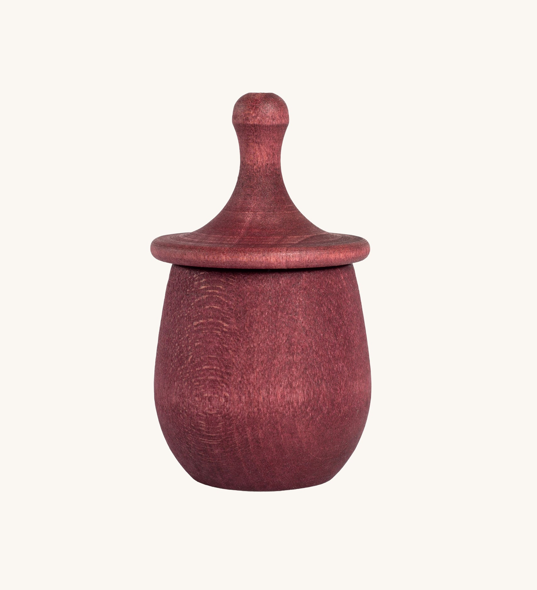 Grapat Red Little Things. A wooden top with eye drawn on and a red coloured pot to match. Grapat have a wide range of wooden toys and loose parts available at Babipur. 