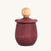 Grapat Red Little Things. A wooden top with eye drawn on and a red coloured pot to match. Grapat have a wide range of wooden toys and loose parts available at Babipur. 