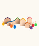 A set of 6 handcrafted Grapat wooden house shaped blocks with coloured roofs and matching peg dolls