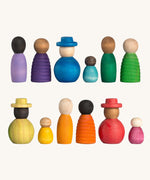 Grapat Together Play Set. A set of 12 rainbow coloured wooden peg dolls in various shapes and sizes. Grapat have a wide range of wooden toys and loose parts available at Babipur. 