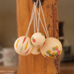 A photo of the wonder balls hanging on a hook